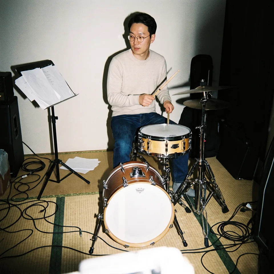 Bryan at the drum kit during rehearsal.